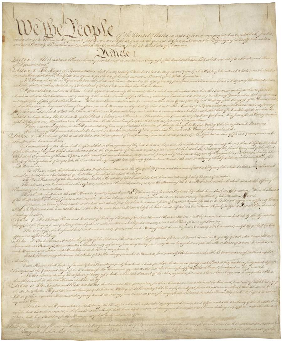 The opening page of the United States Constitution, beginning We the People